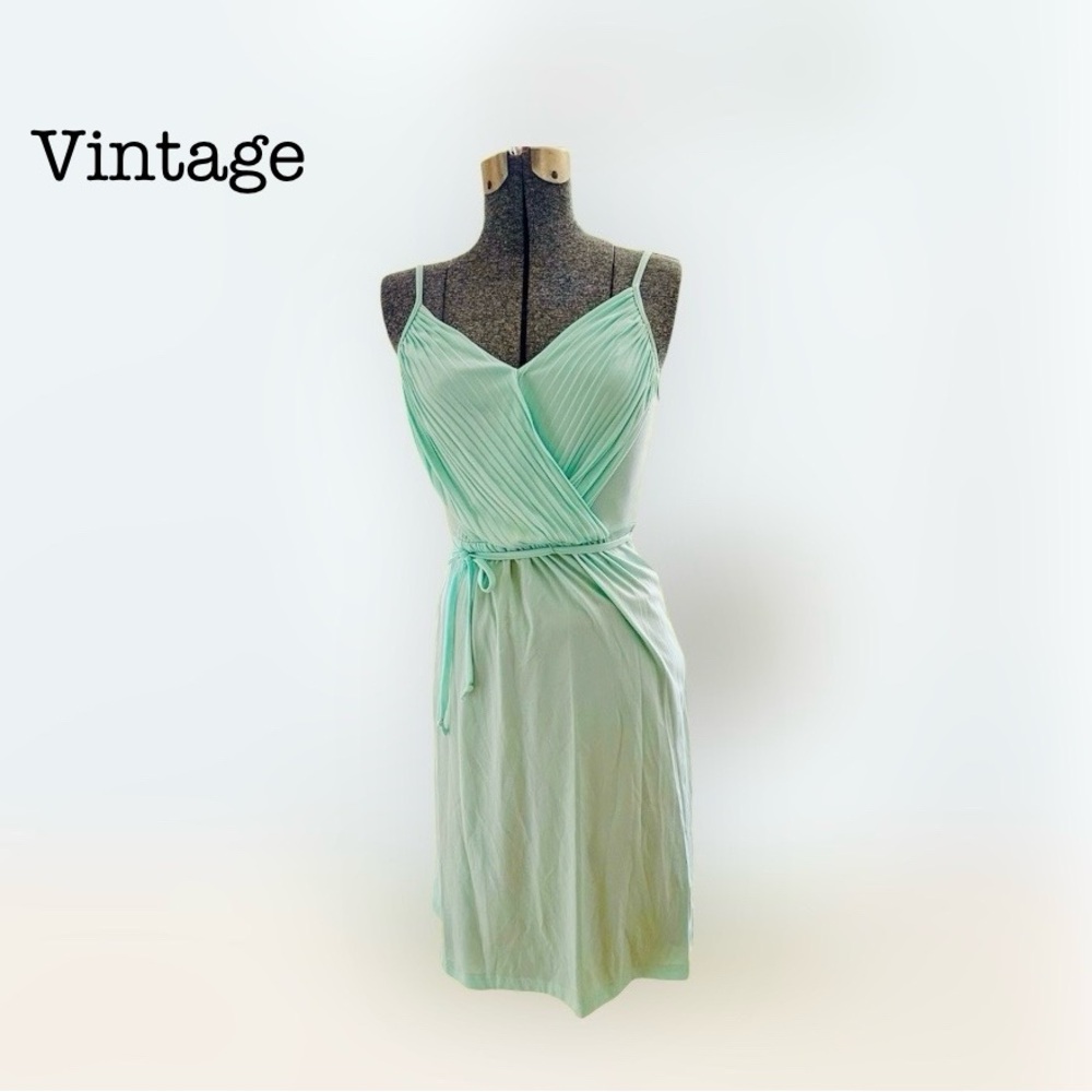 Vintage mint green spaghetti strap dress small. Excellent vintage condition.